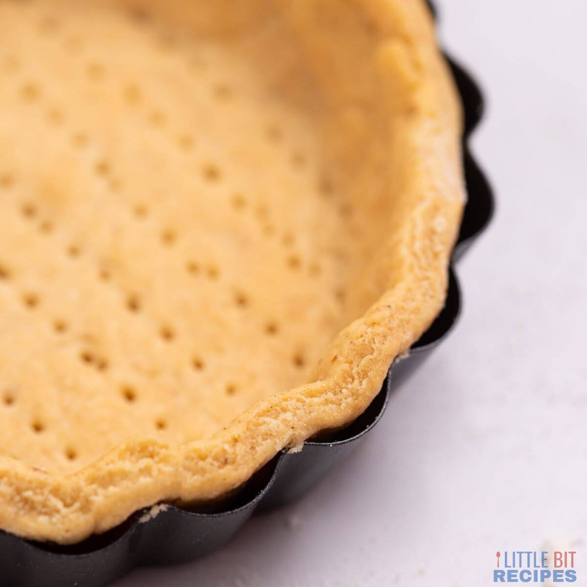 baked mini pie crust close up.