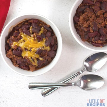 slow-cooker chili for two in small white bowls.