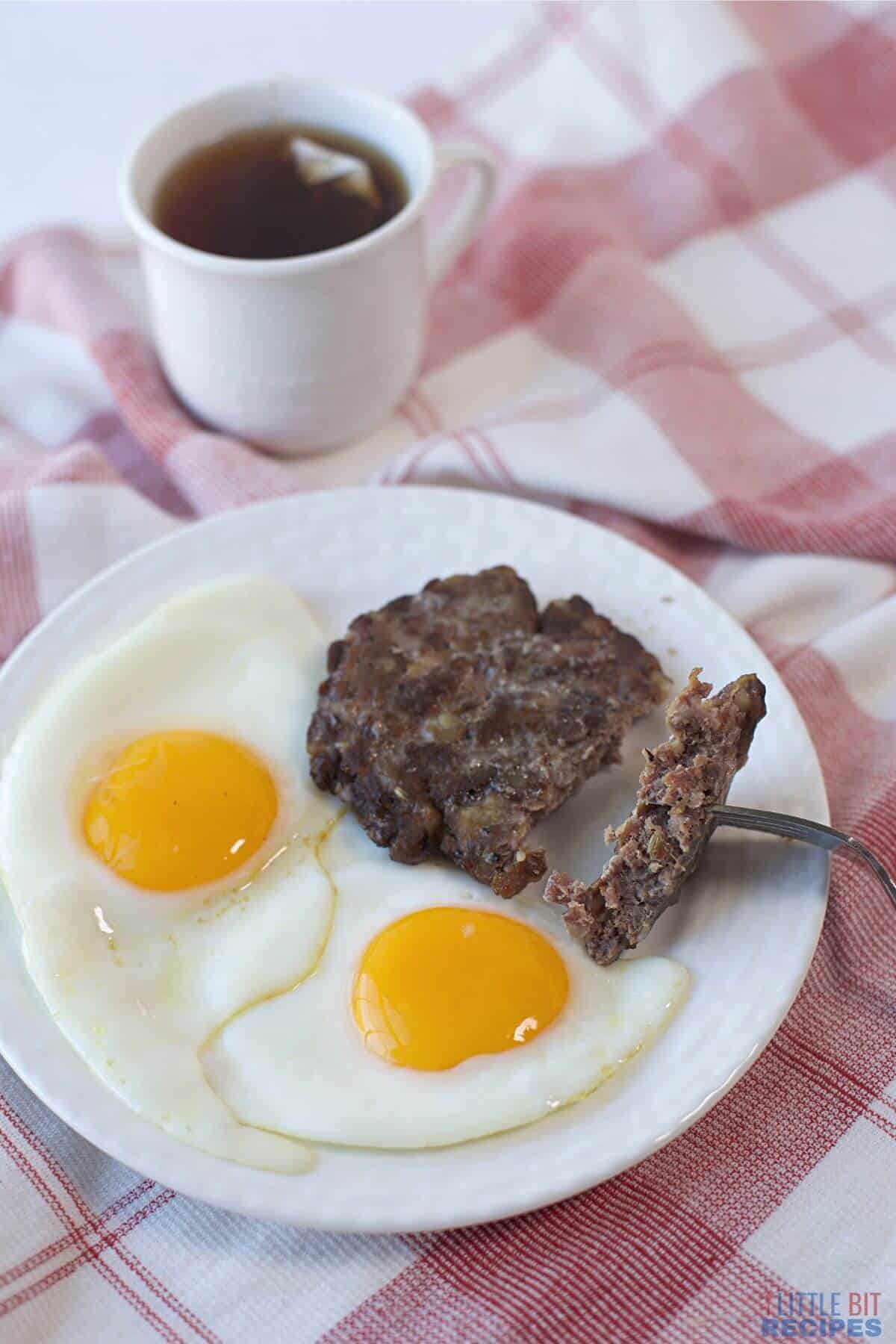 baked sausage patties with fried eggs.