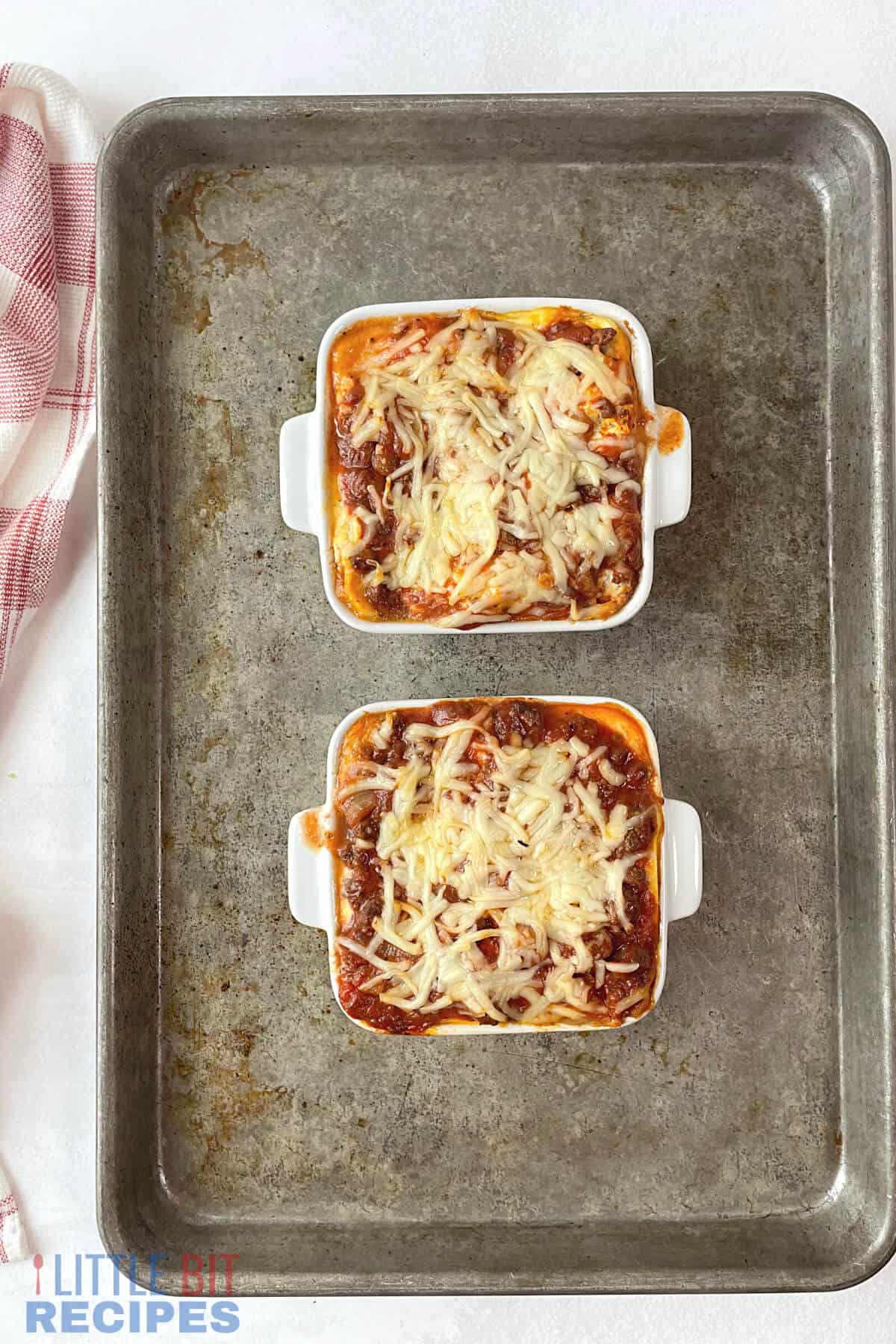baked mini lasagnas on sheet pan.