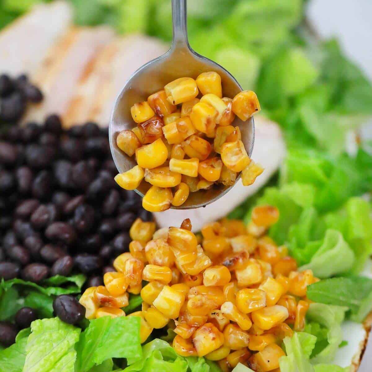 adding black beans and corn.