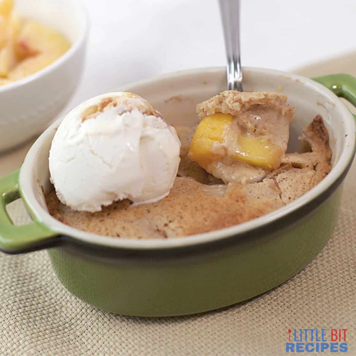 peach cobbler for one with ice cream.