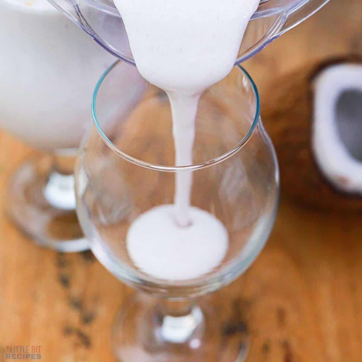 pouring the shake into a glass.