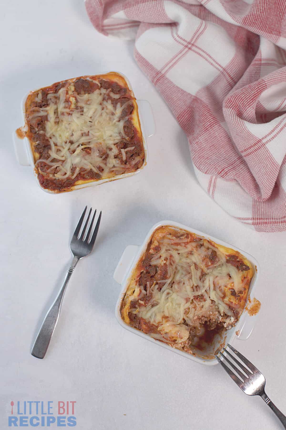 single serve lasagnas with forks.