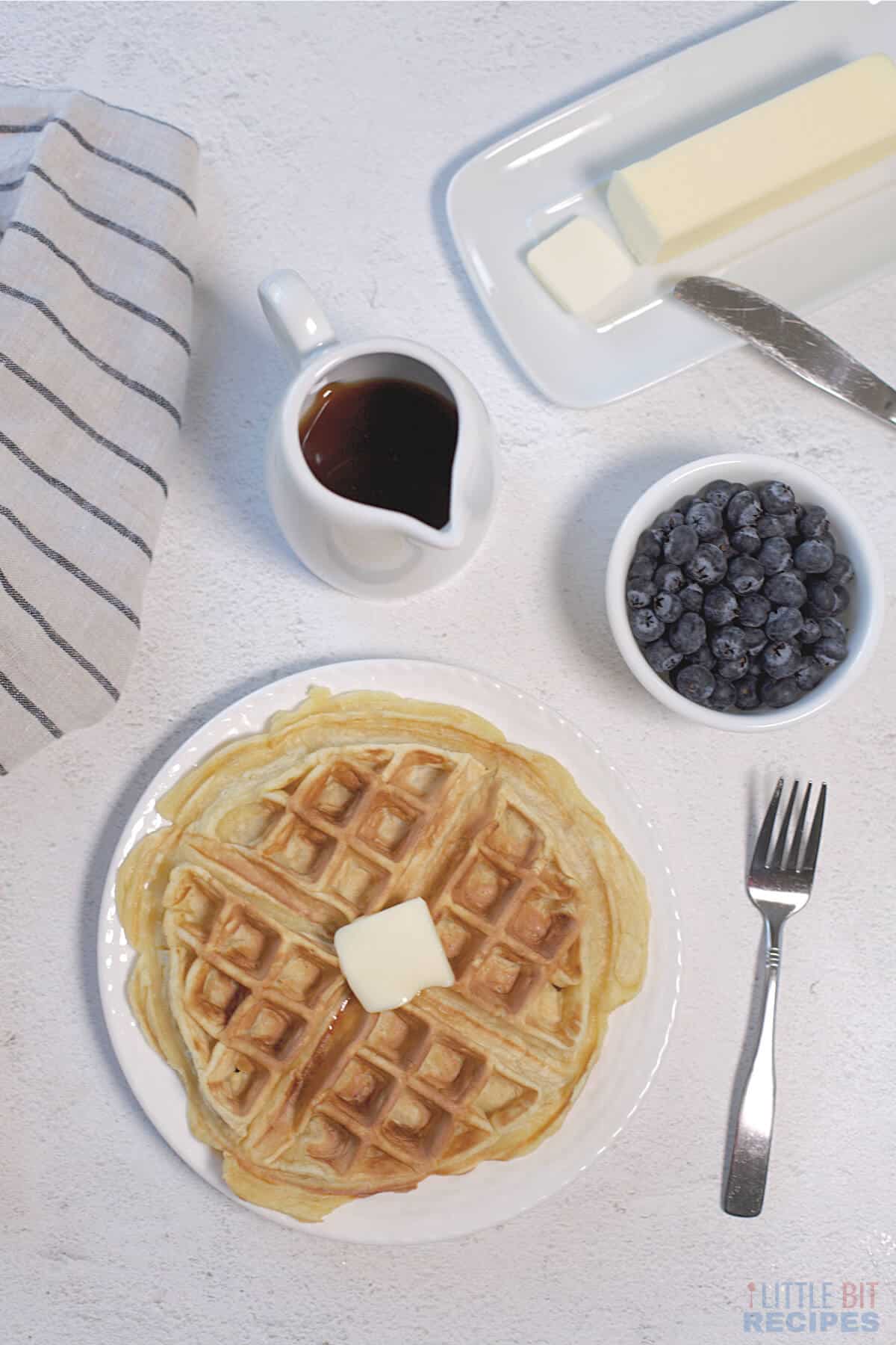 single serve waffle with butter.