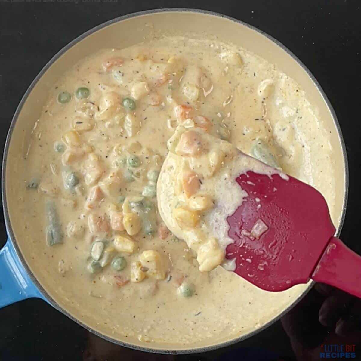 thickened cream sauce on spatula.