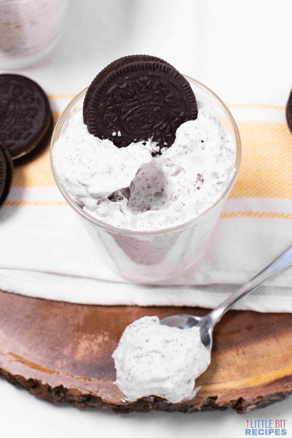 cookies and cream mousse dessert with spoon bite.