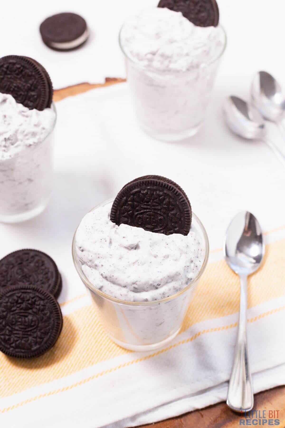 cookie topped mousse in glasses.