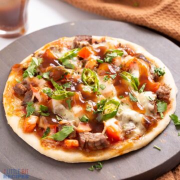mexican steak pizza with carne asada.