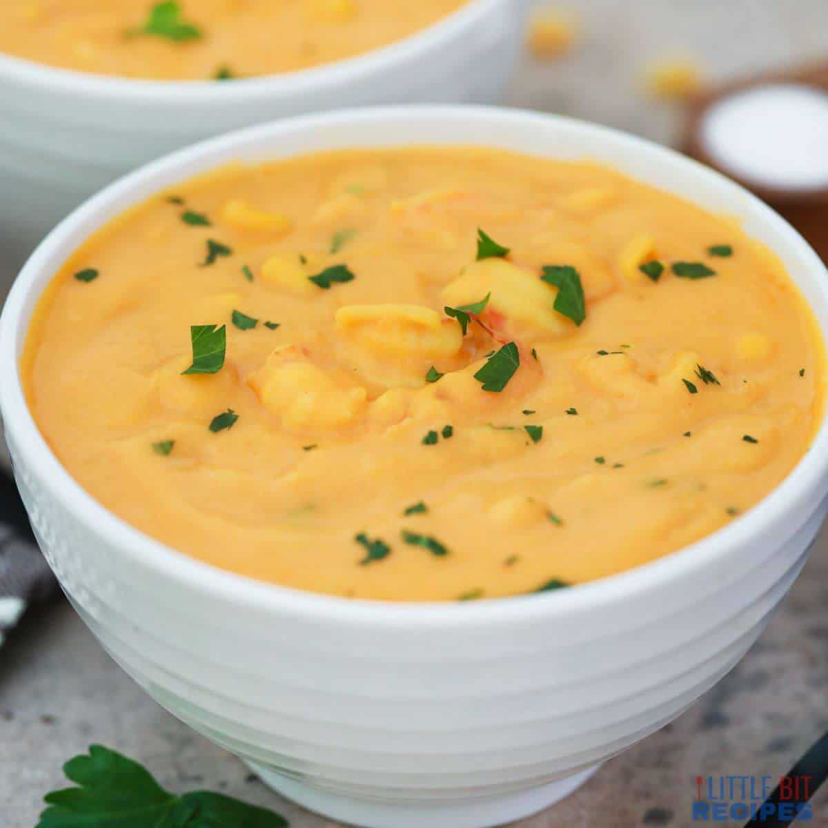 shrimp corn bisque in bowls.