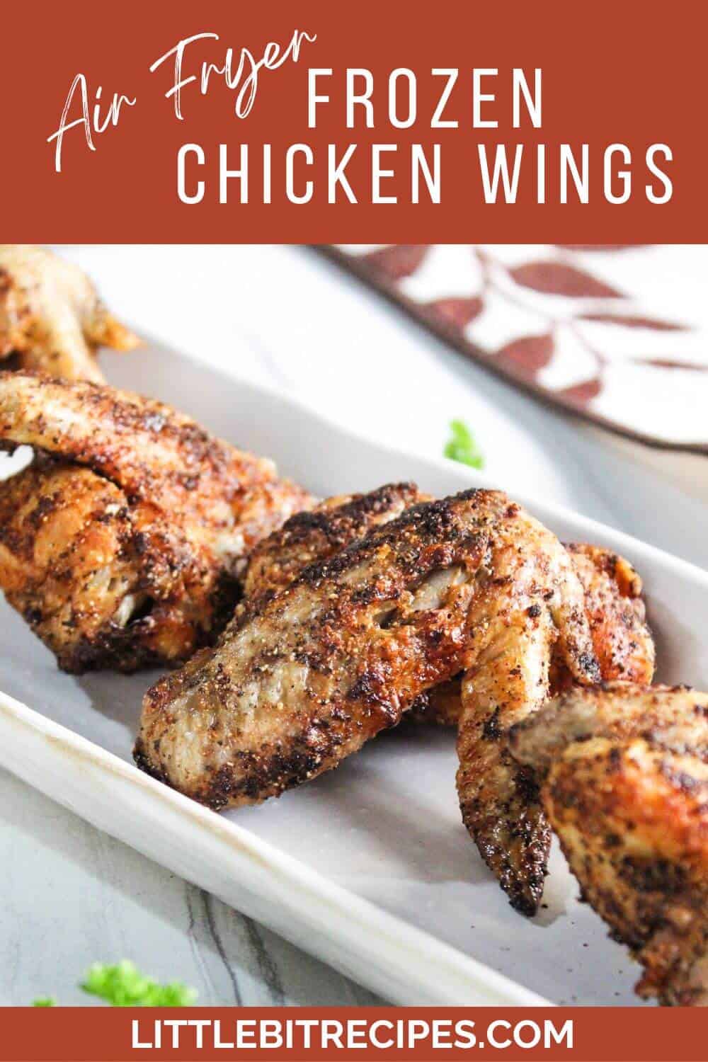air fryer frozen chicken wings with text.