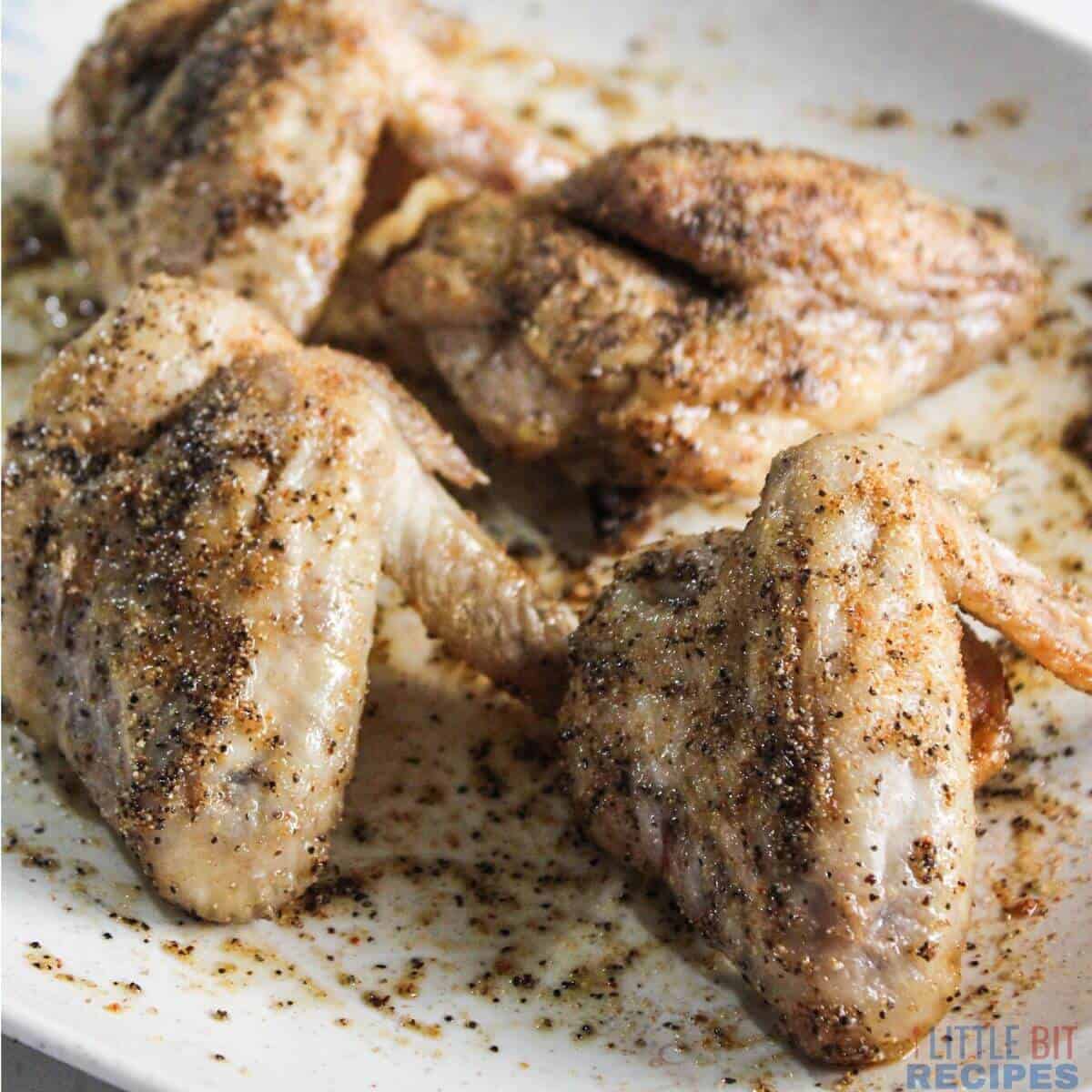 seasoned partially cooked chicken wings.