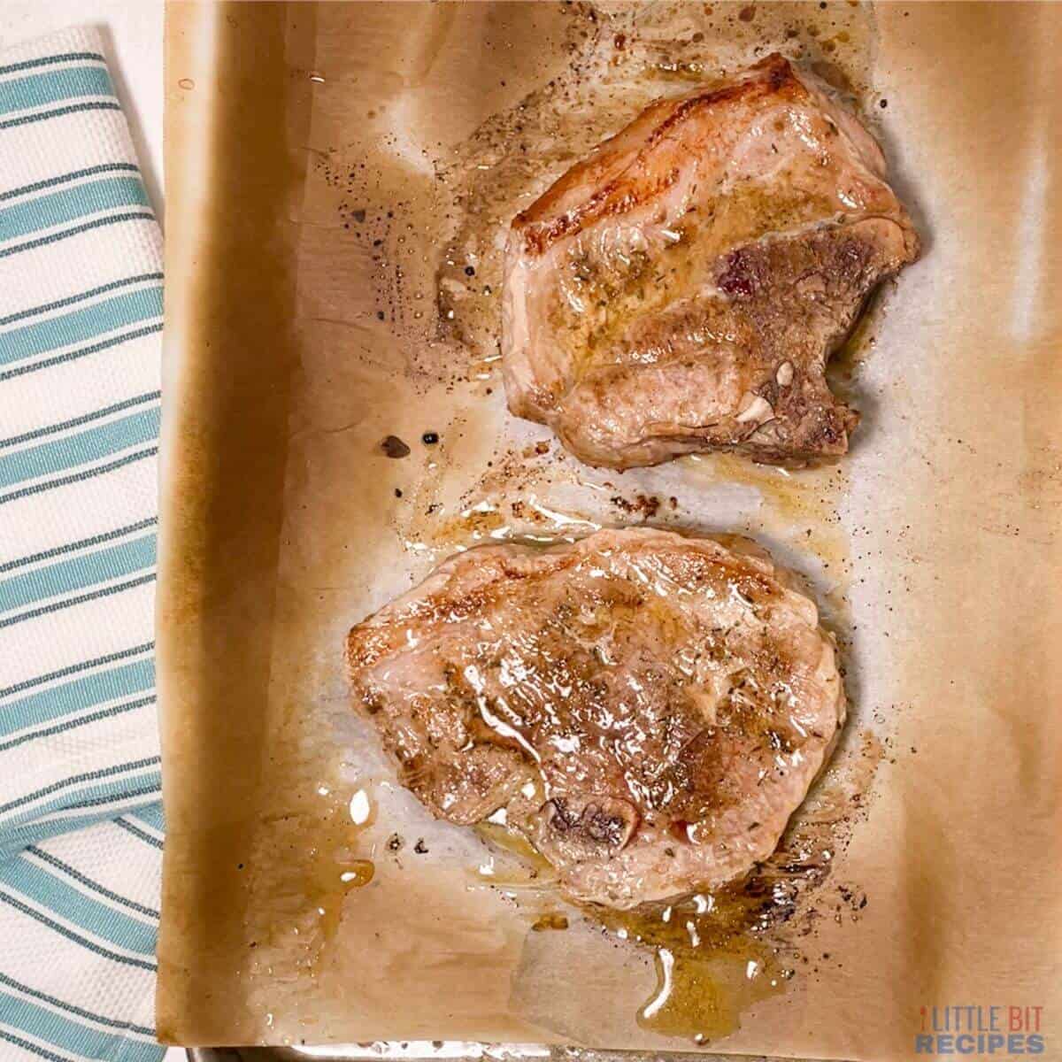 baked pork on lined sheet pan.