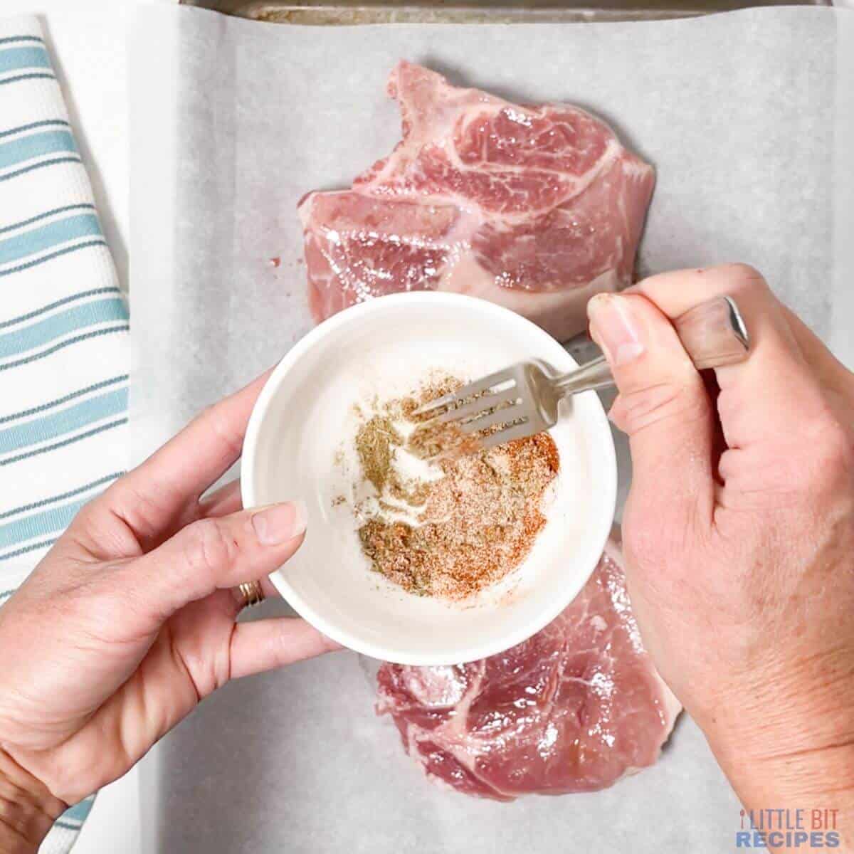 blending seasonings in bowl.