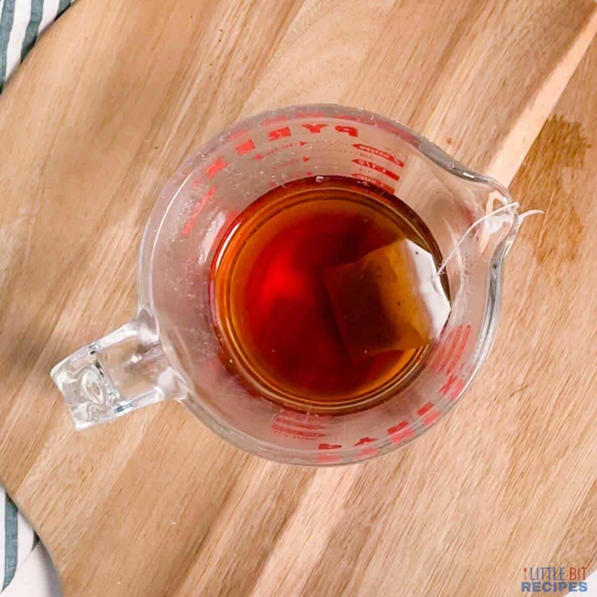 brewing tea in pyrex measuring cup.