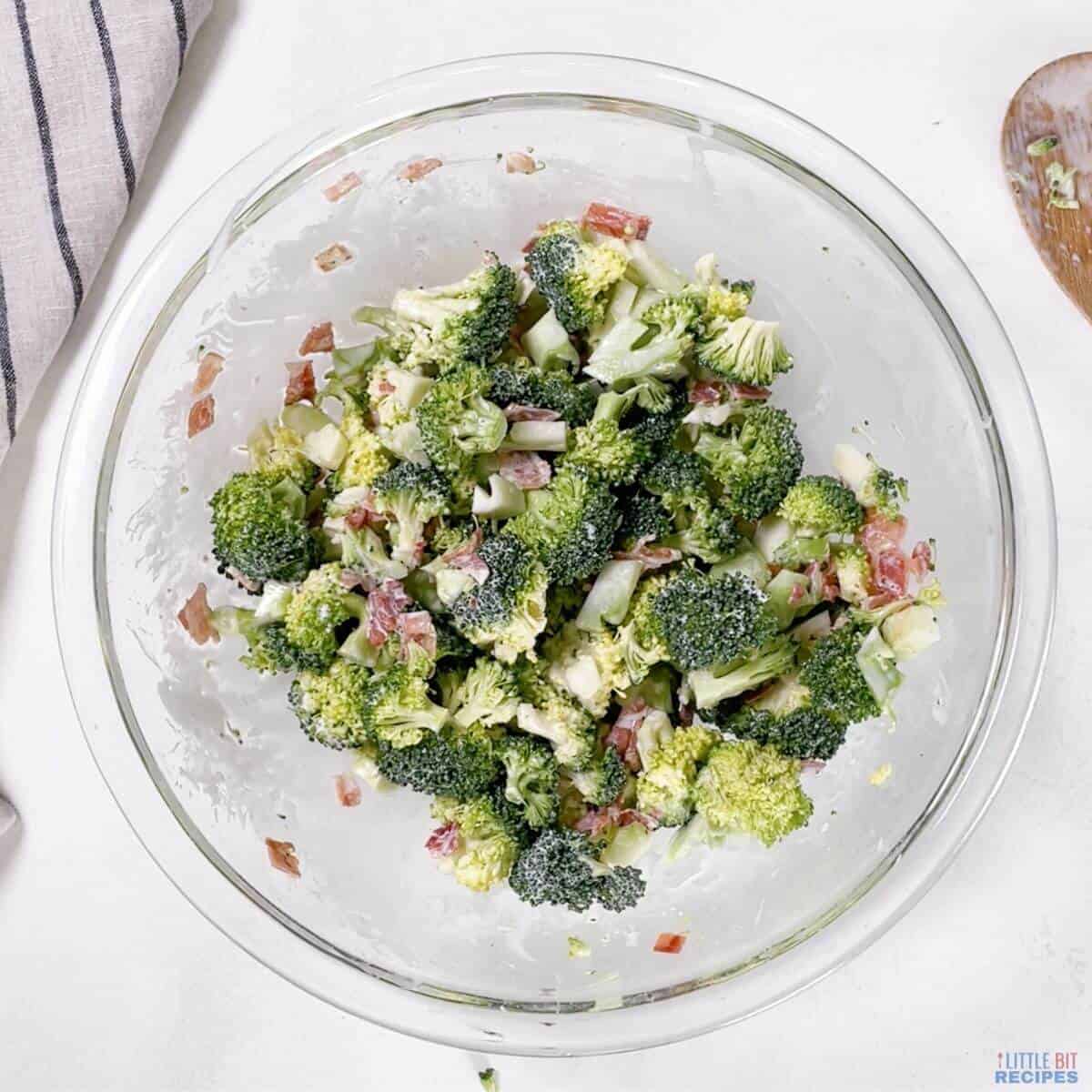 broccoli salad mixed in bowl.