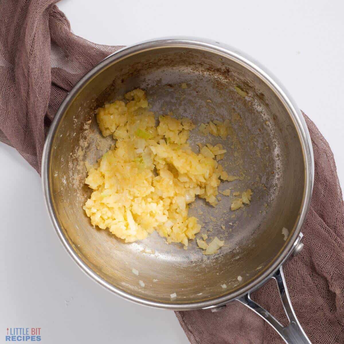 flour thickener added to saucepan.