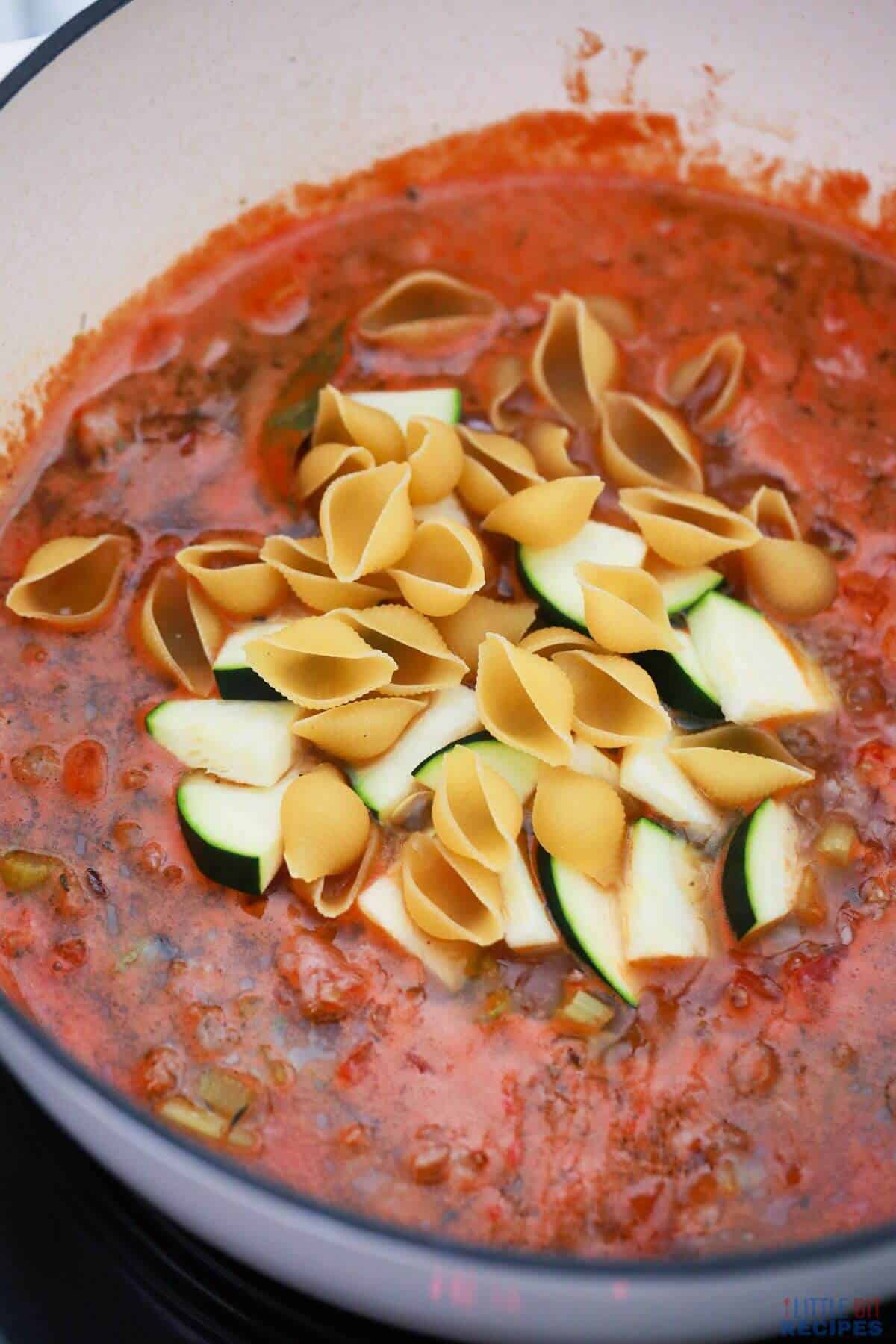 pasta and zucchini added to pot.