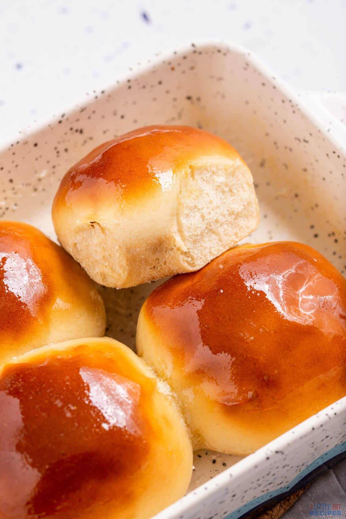 serving yeast rolls in pan.