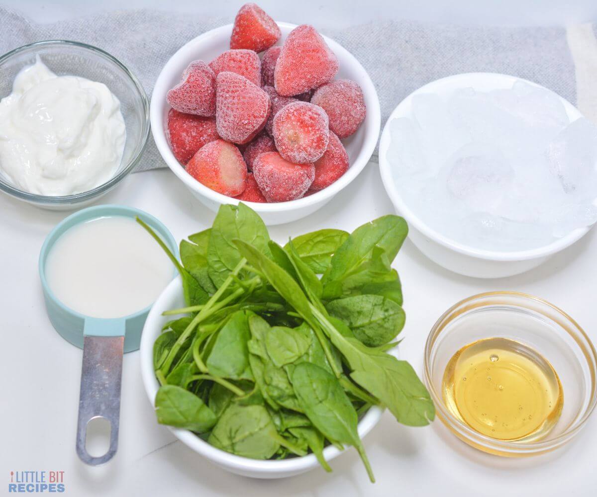 ingredients for strawberry spinach smoothie recipe.