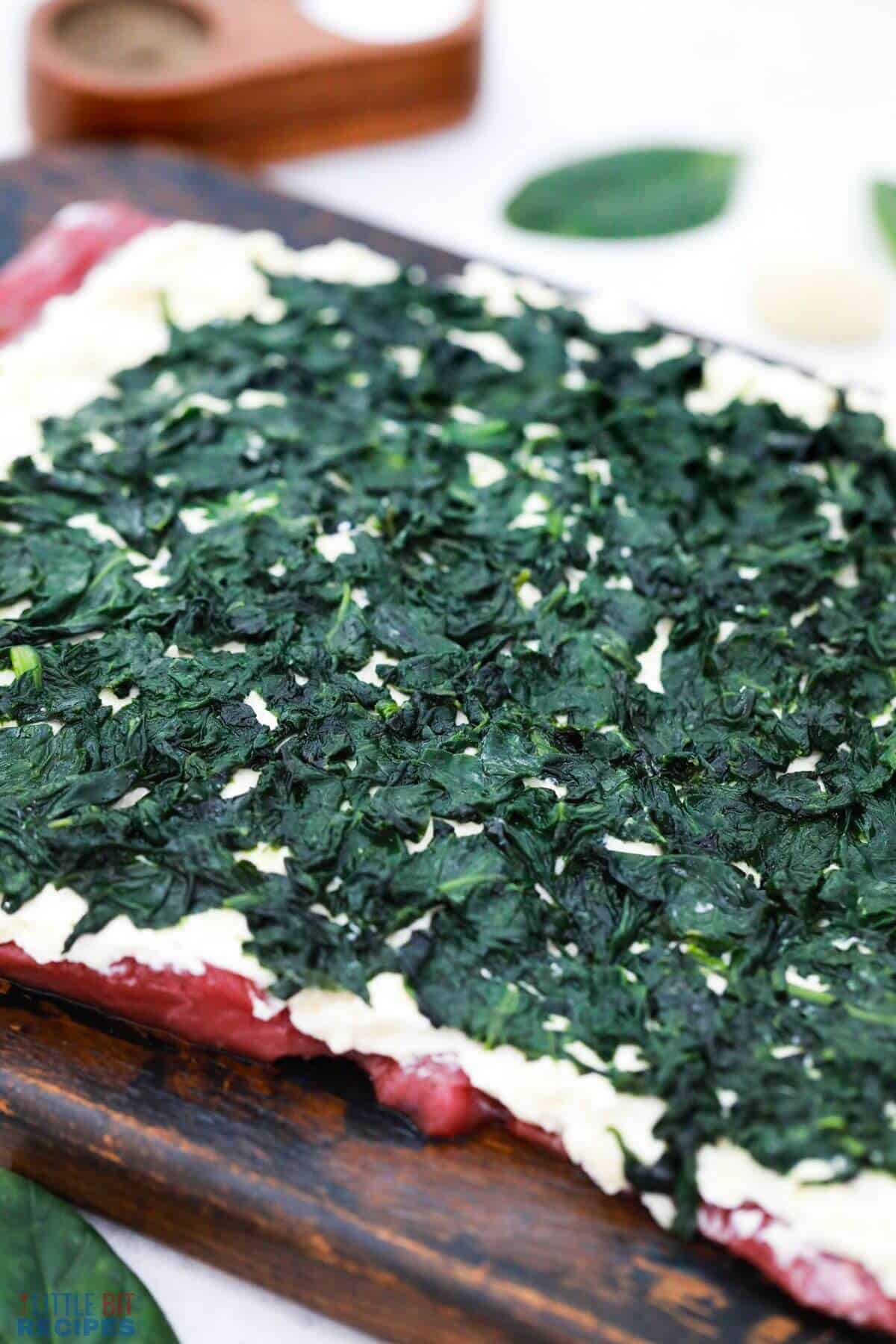 spinach layered over cheese.