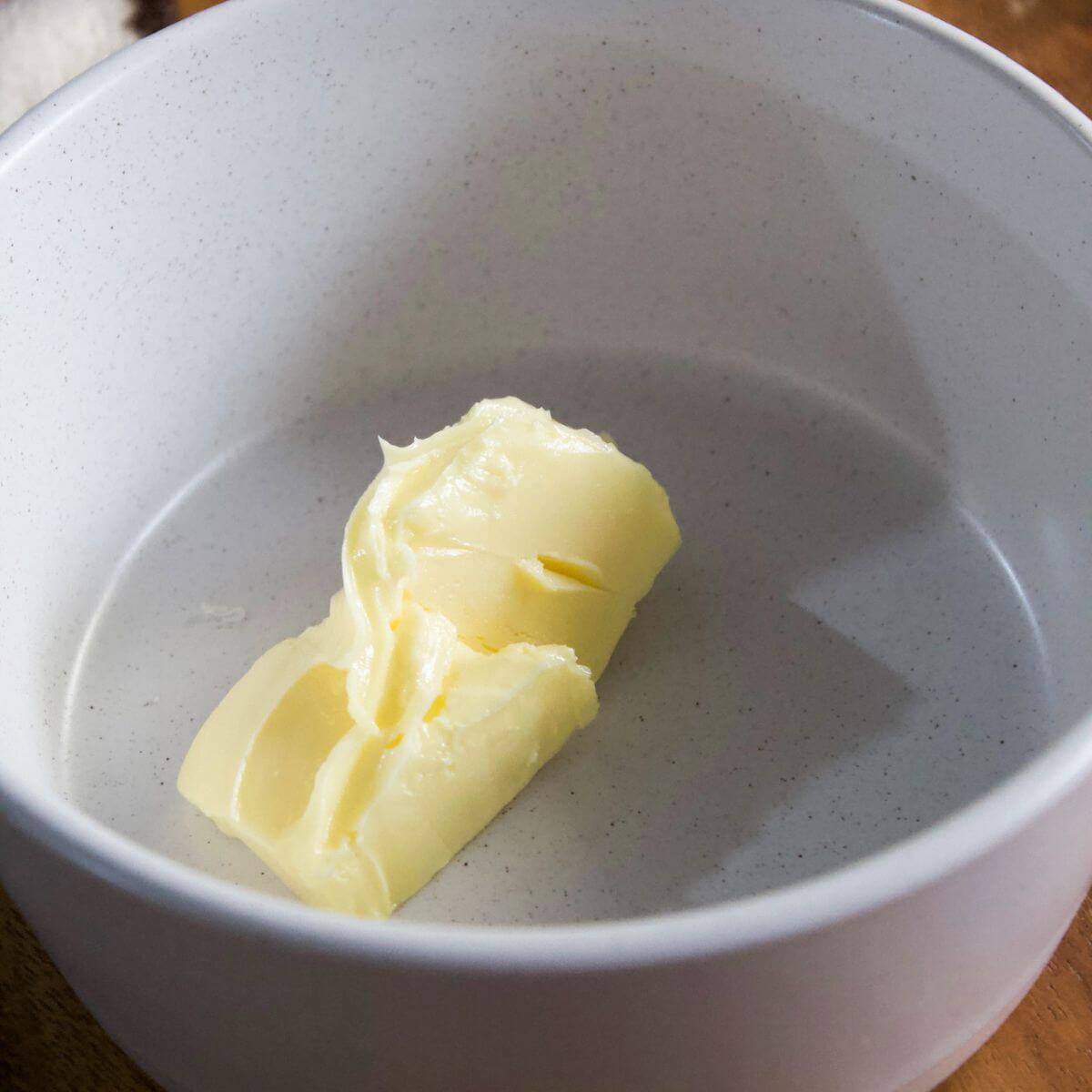 softened butter in small bowl.
