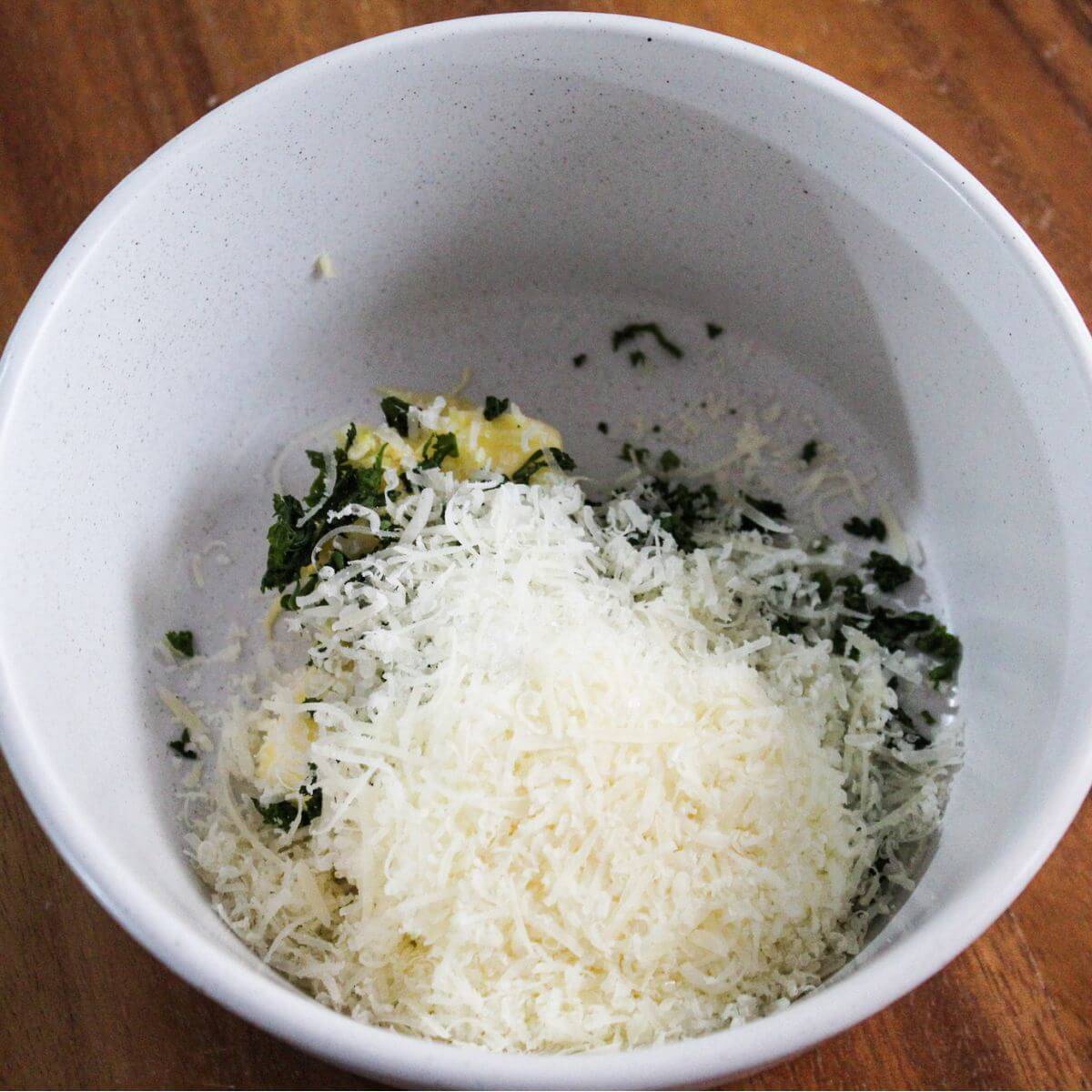grated parmesan on top of butter and parsley.