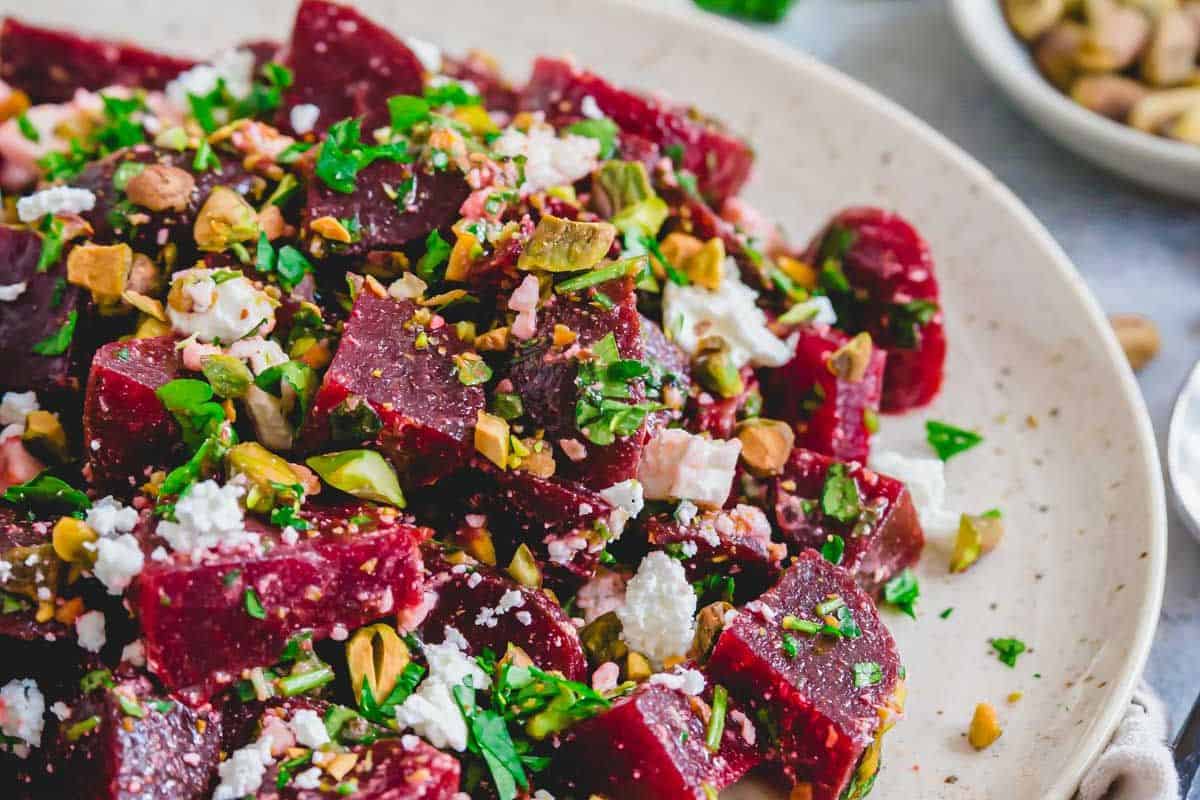 Beet salad with feta served on a plate.