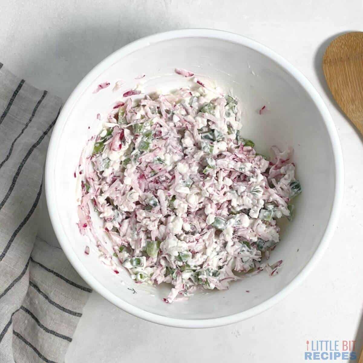 radish salad in mixing bowl.