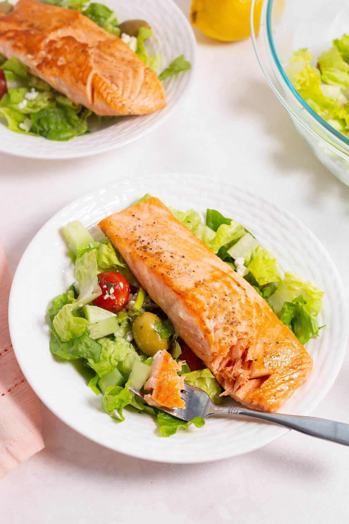 fork bite of salmon salad.