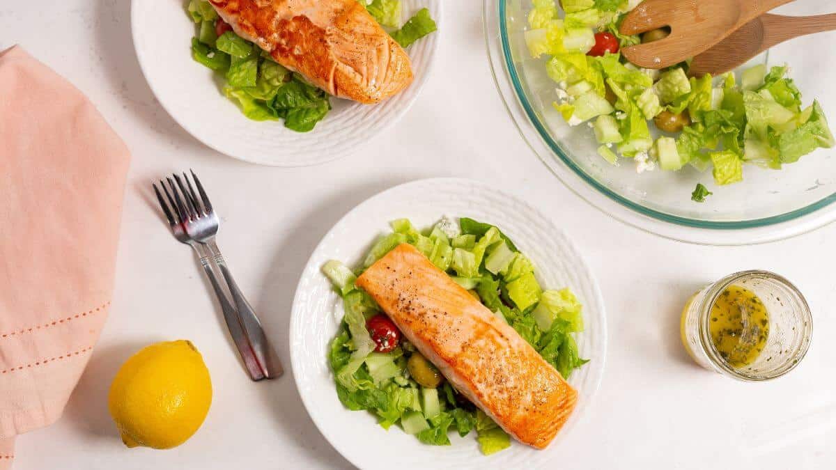 salmon salad with lemon and dressing.