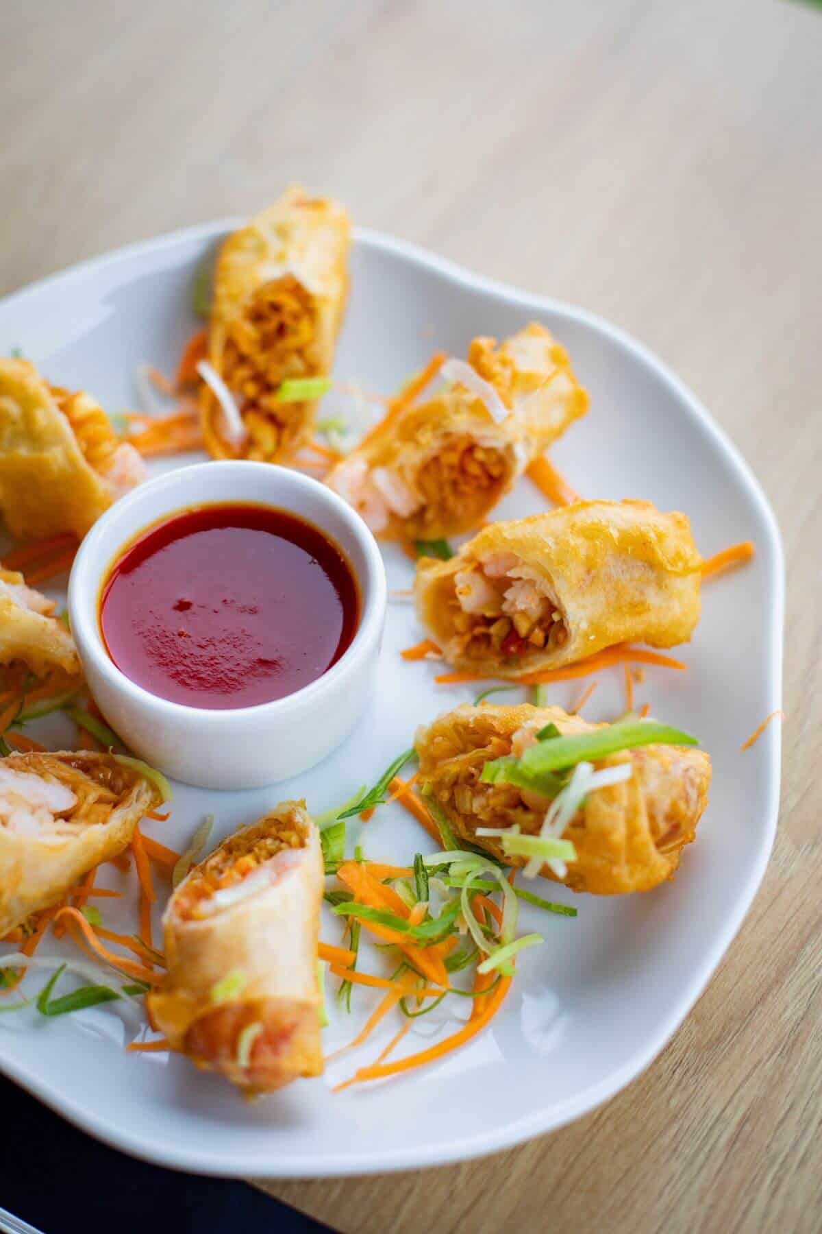spring rolls with dip party food.