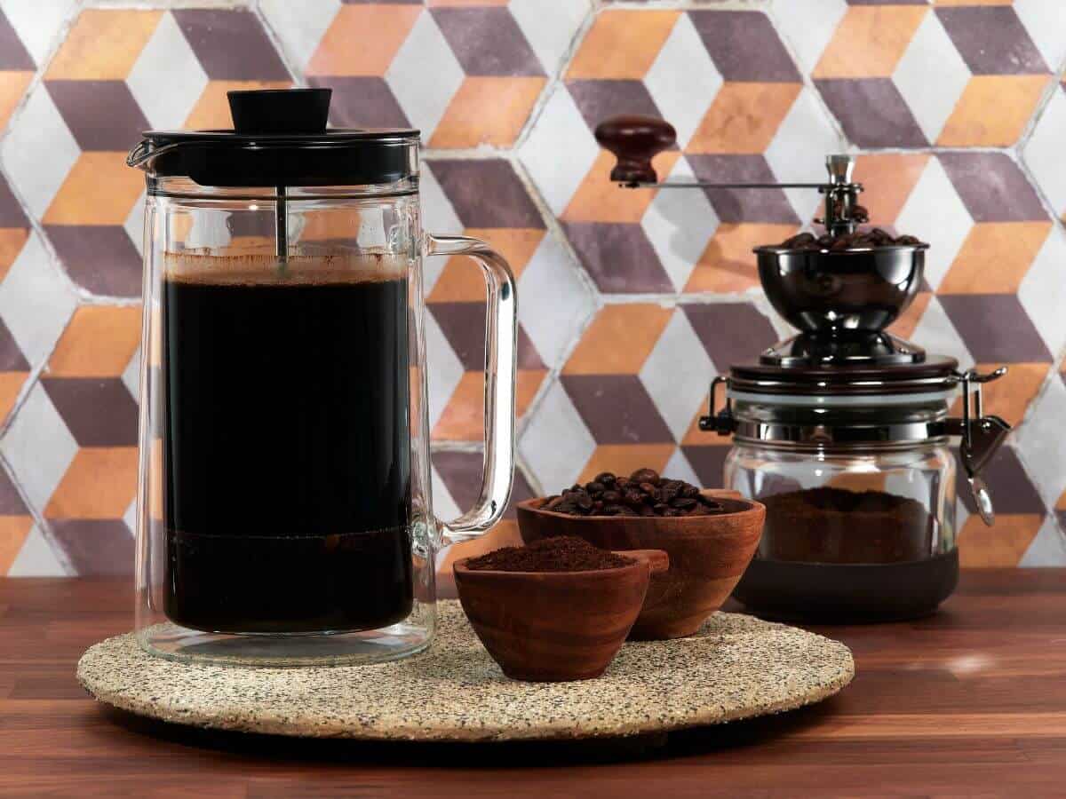 French press with ground beans.
