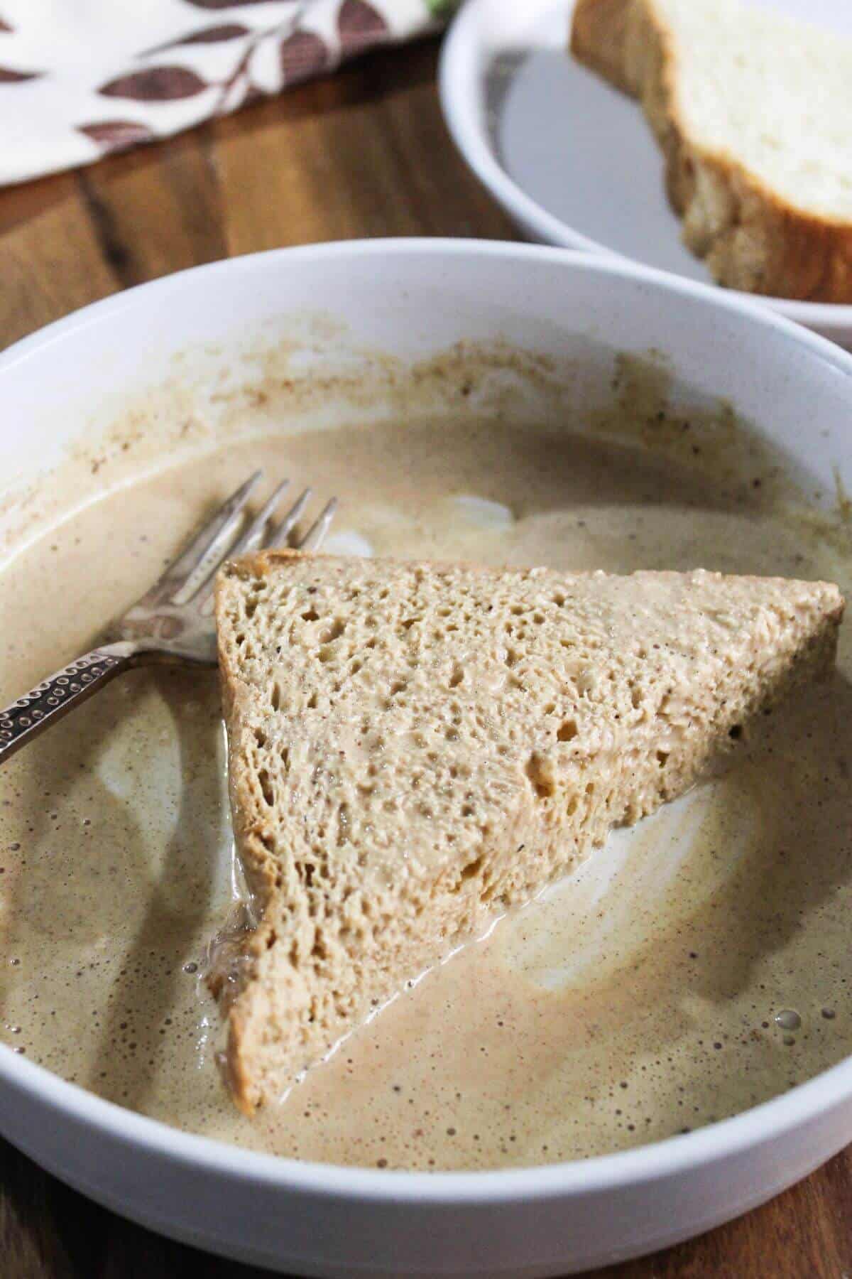 Soaking other side of bread in egg mixture.