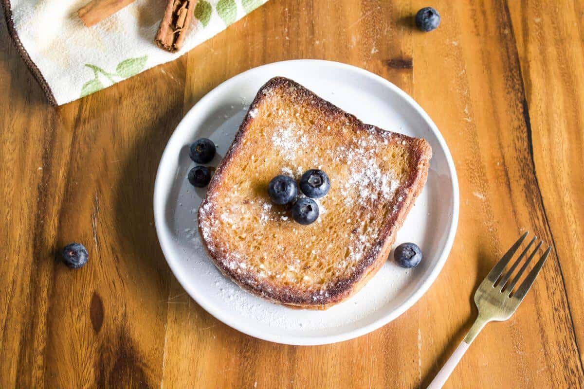 Slice of brioche french toast for one.