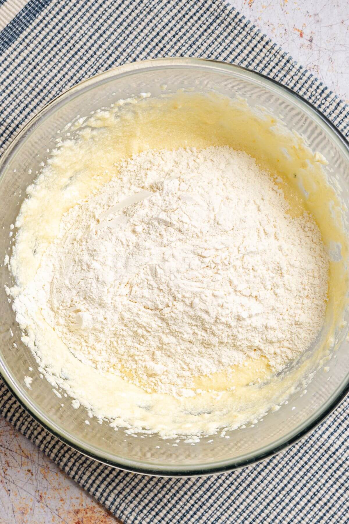 Flour mixture added to wet mixture.