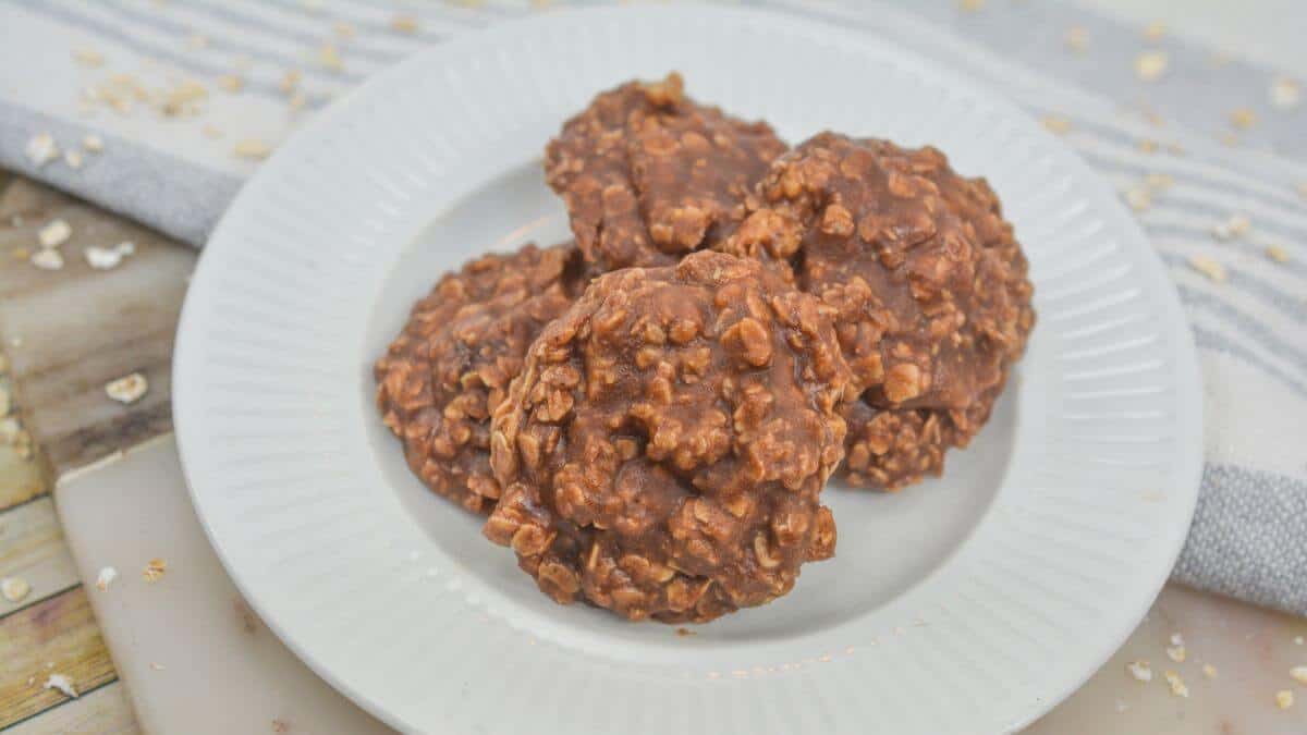 Chocolate oatmeal no-bake cookies on a white plate.