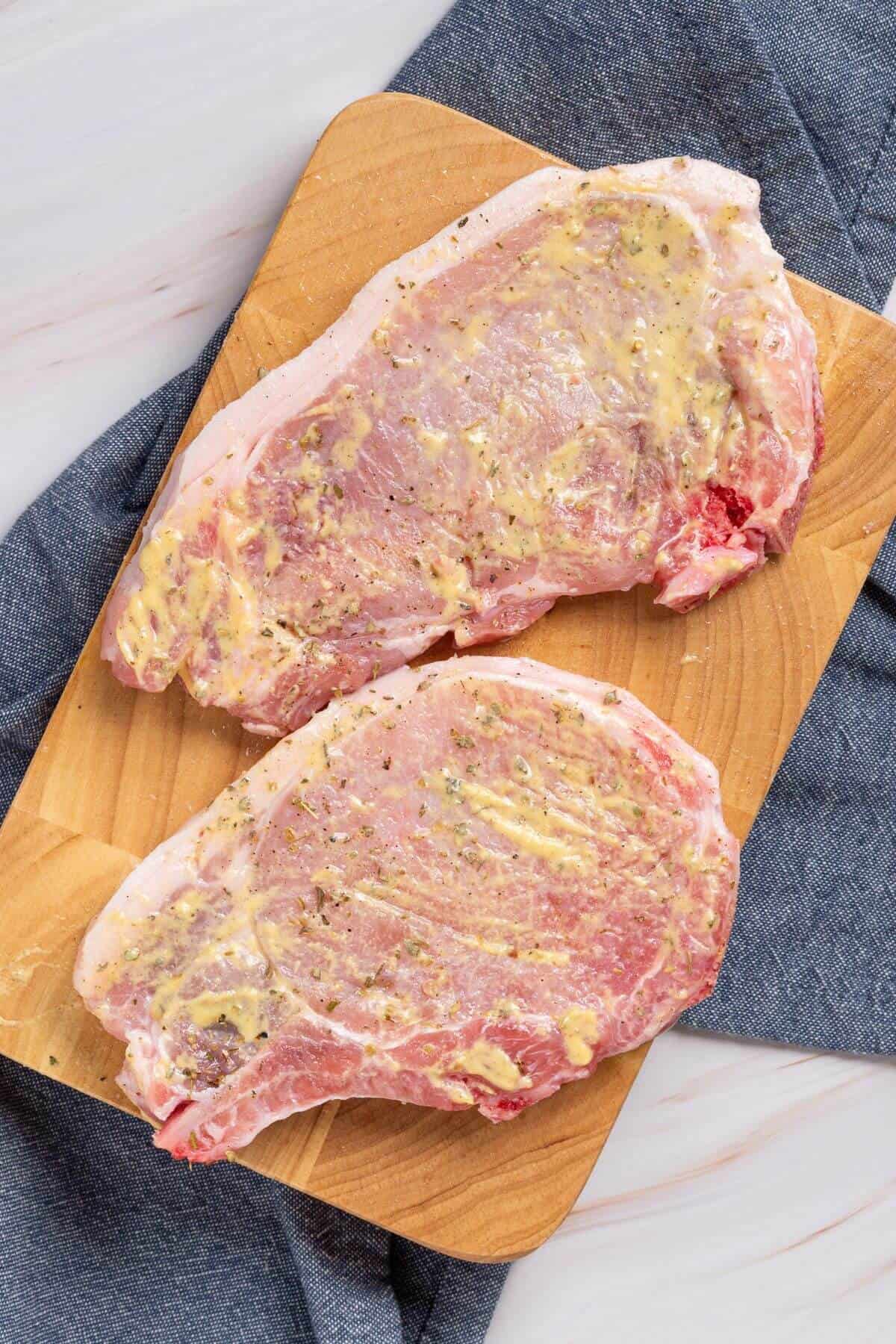 Meat coated with seasonings.