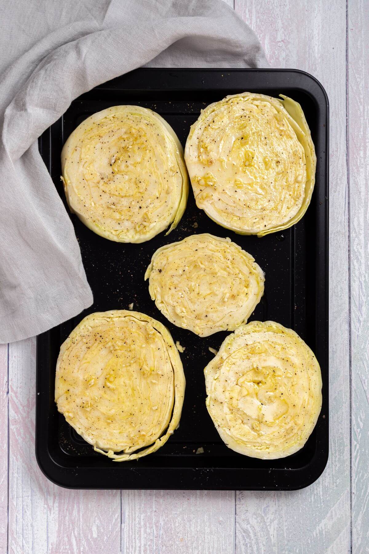 Prepared slices on sheet pan.