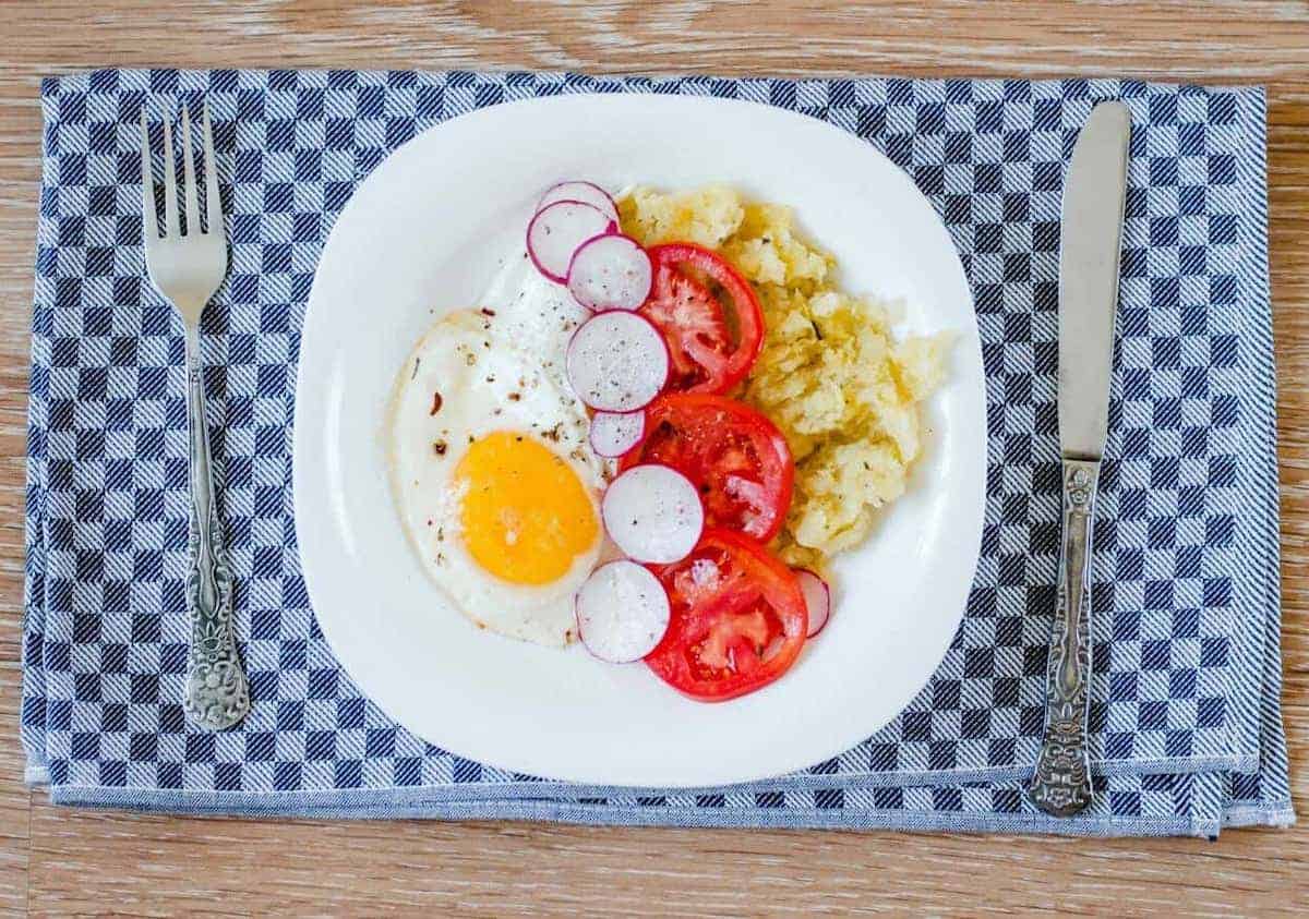 Fried egg with pan fried radish slices.
