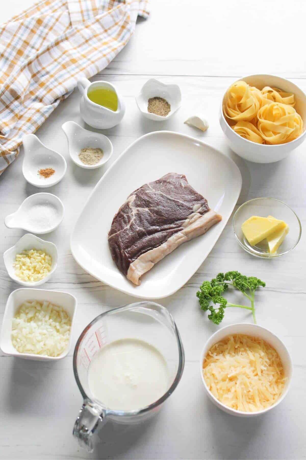 Ingredients for alfredo steak pasta recipe.