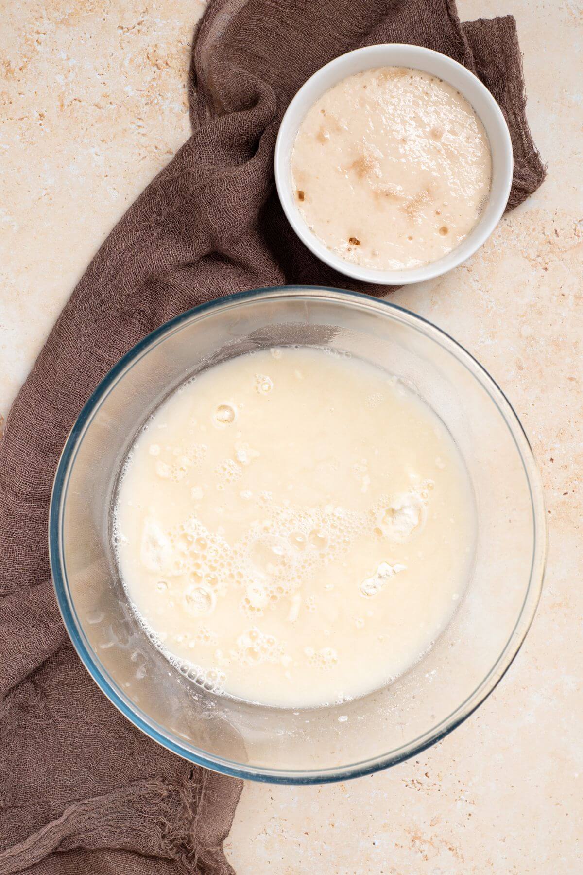 Flour and water in bowl with prepared yeast.