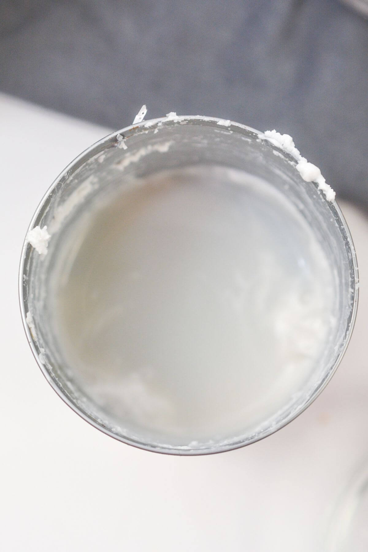 Can of coconut milk with cream removed.