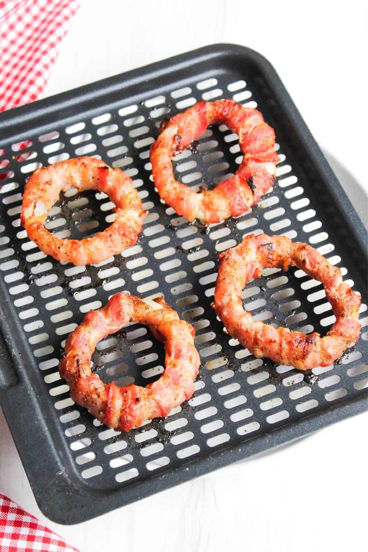 Air fried bacon wrapped onion rings.