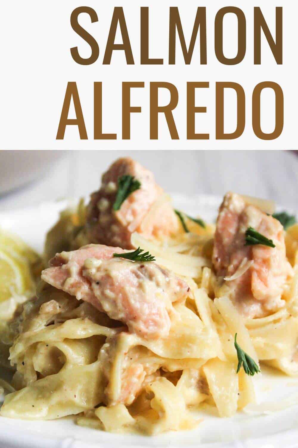 Salmon alfredo pasta with text overlay.