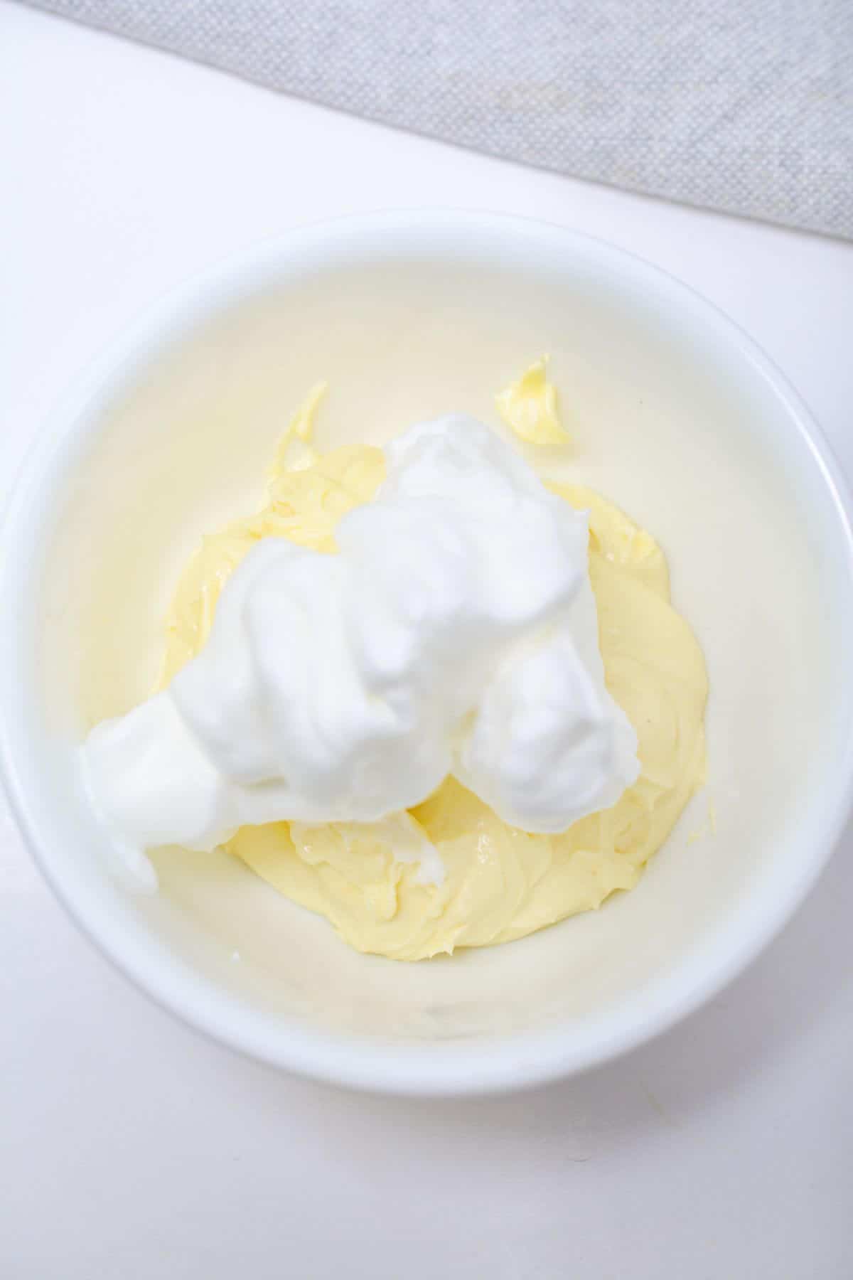 Added egg white mixture to cream cheese mixture.