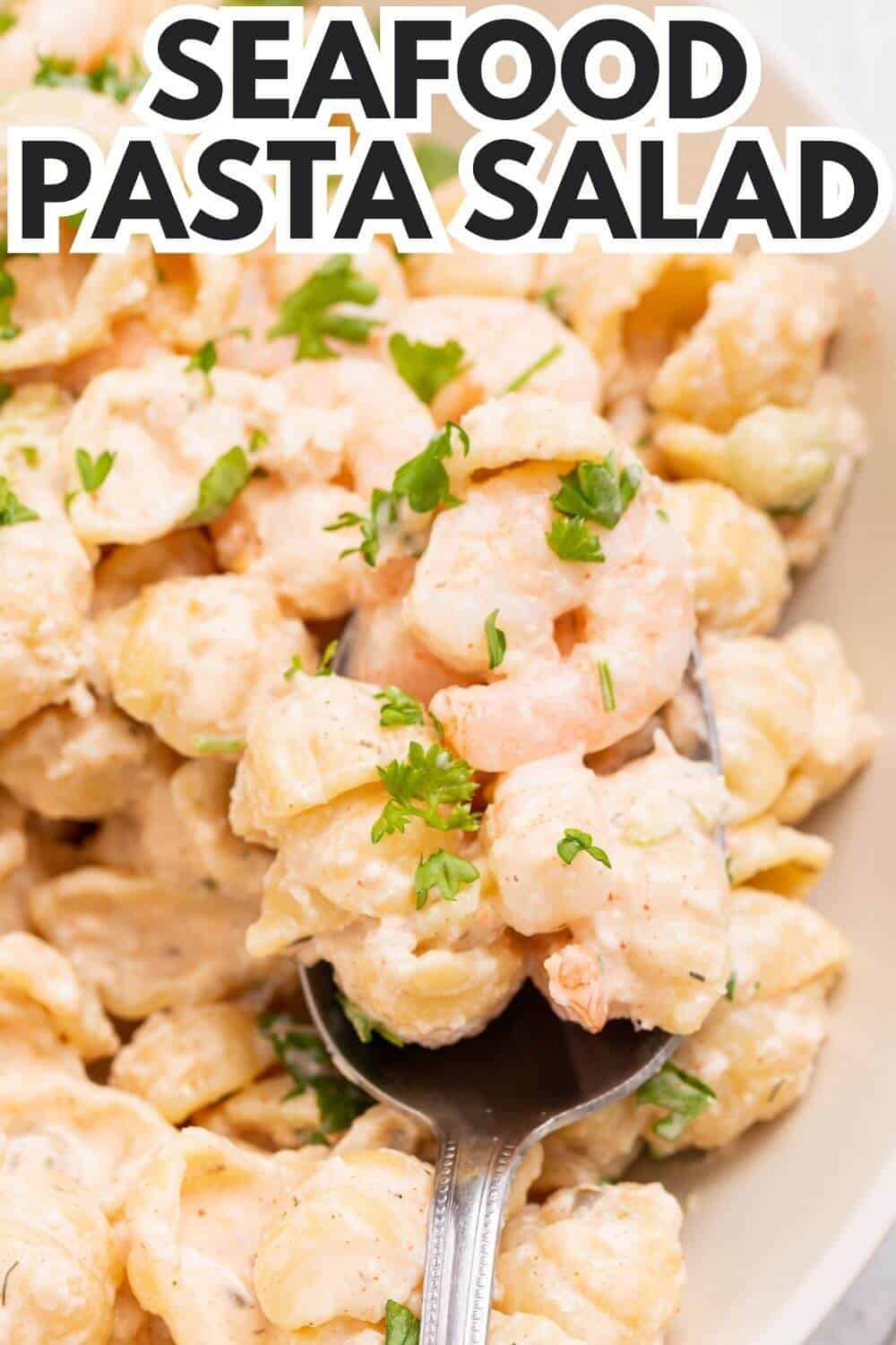 Seafood pasta salad with recipe title text overlay.