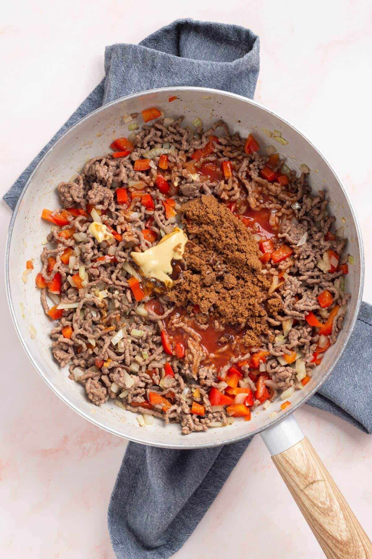 Seasoning added to browned ground beef.