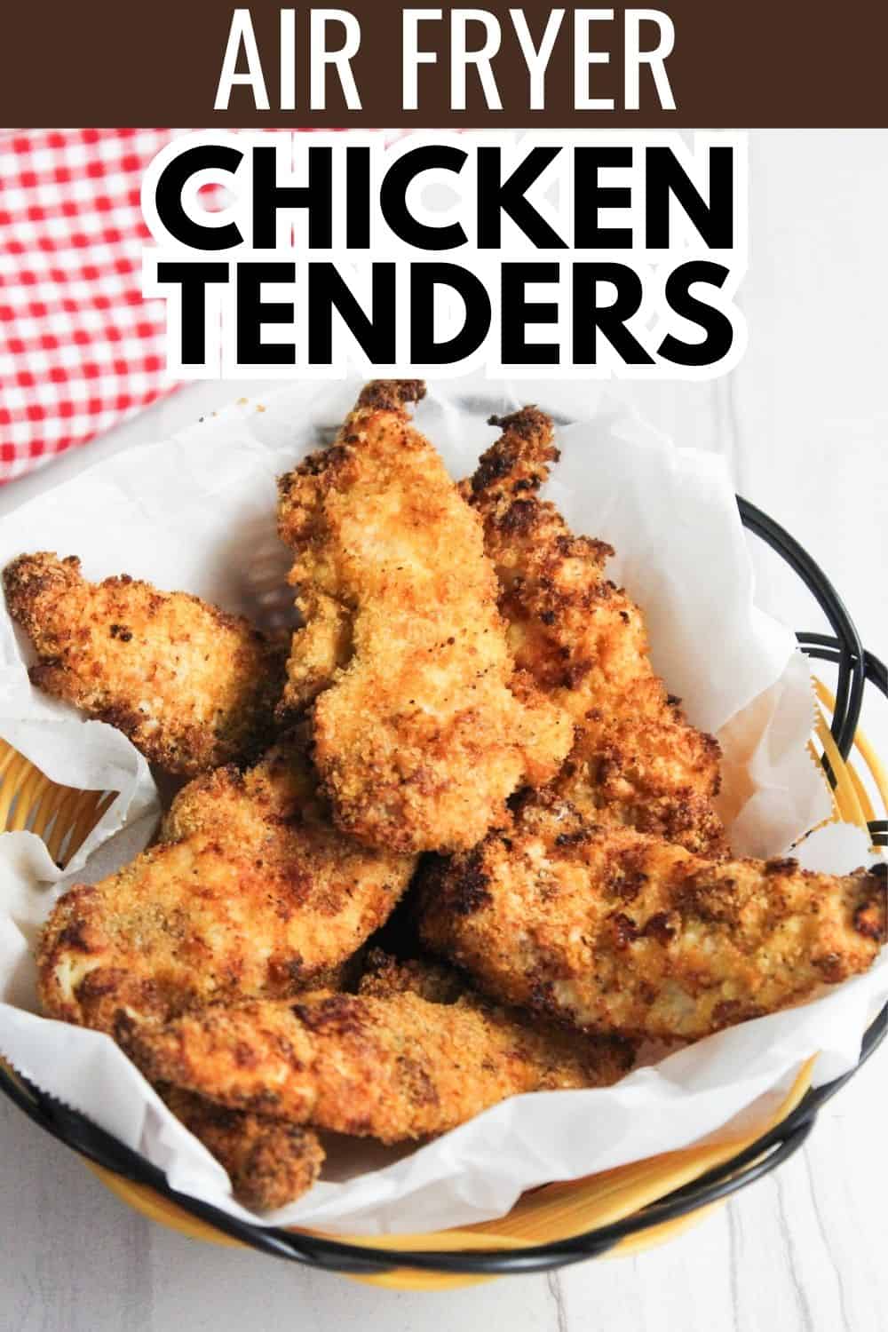 Air fryer chicken tenders in a bowl with the text air fryer chicken tenders.