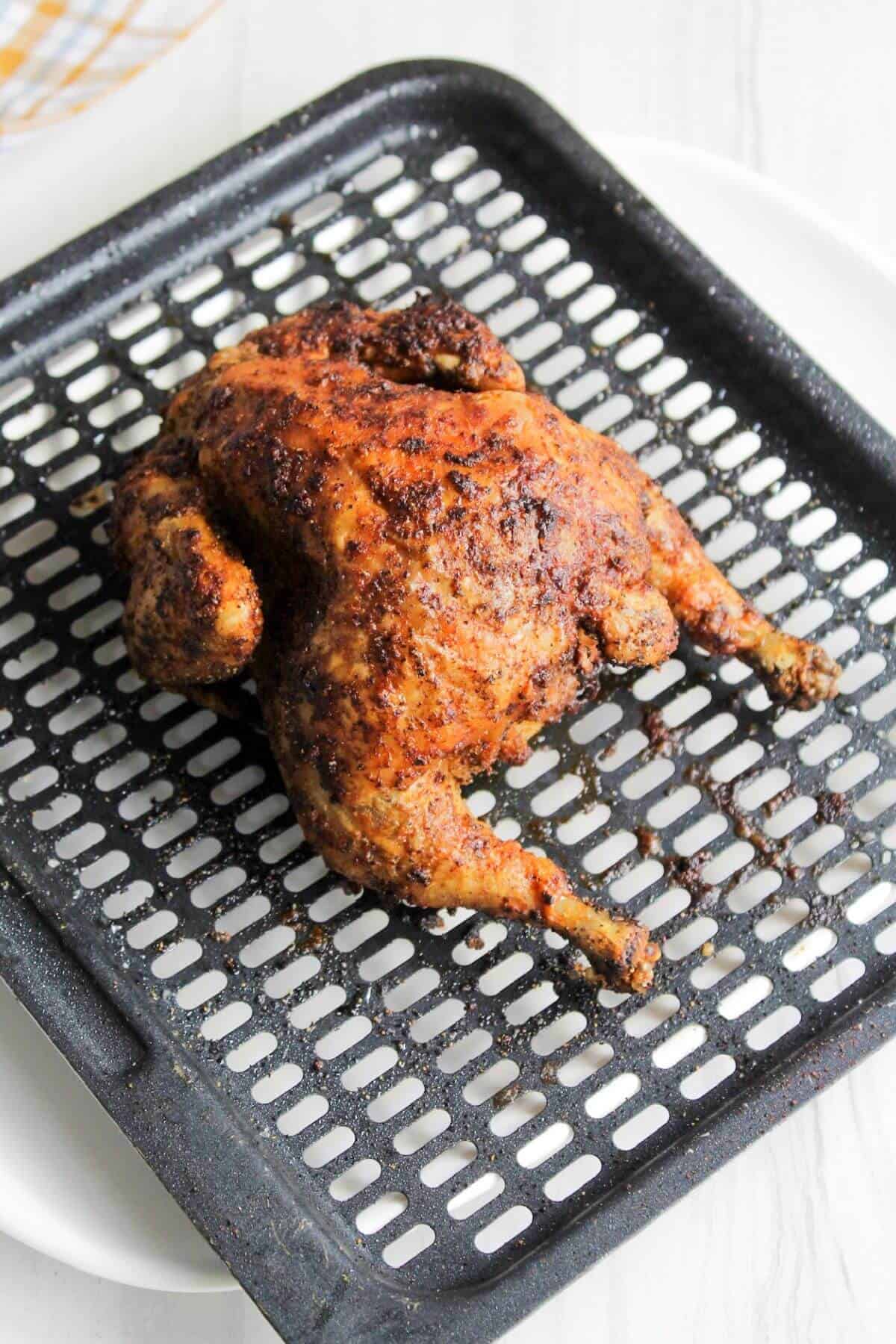 Fully cooked cornish hen after air frying.